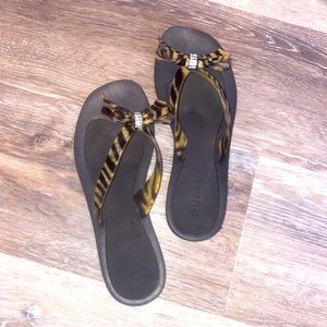 Guess Cheetah bow flip flops!